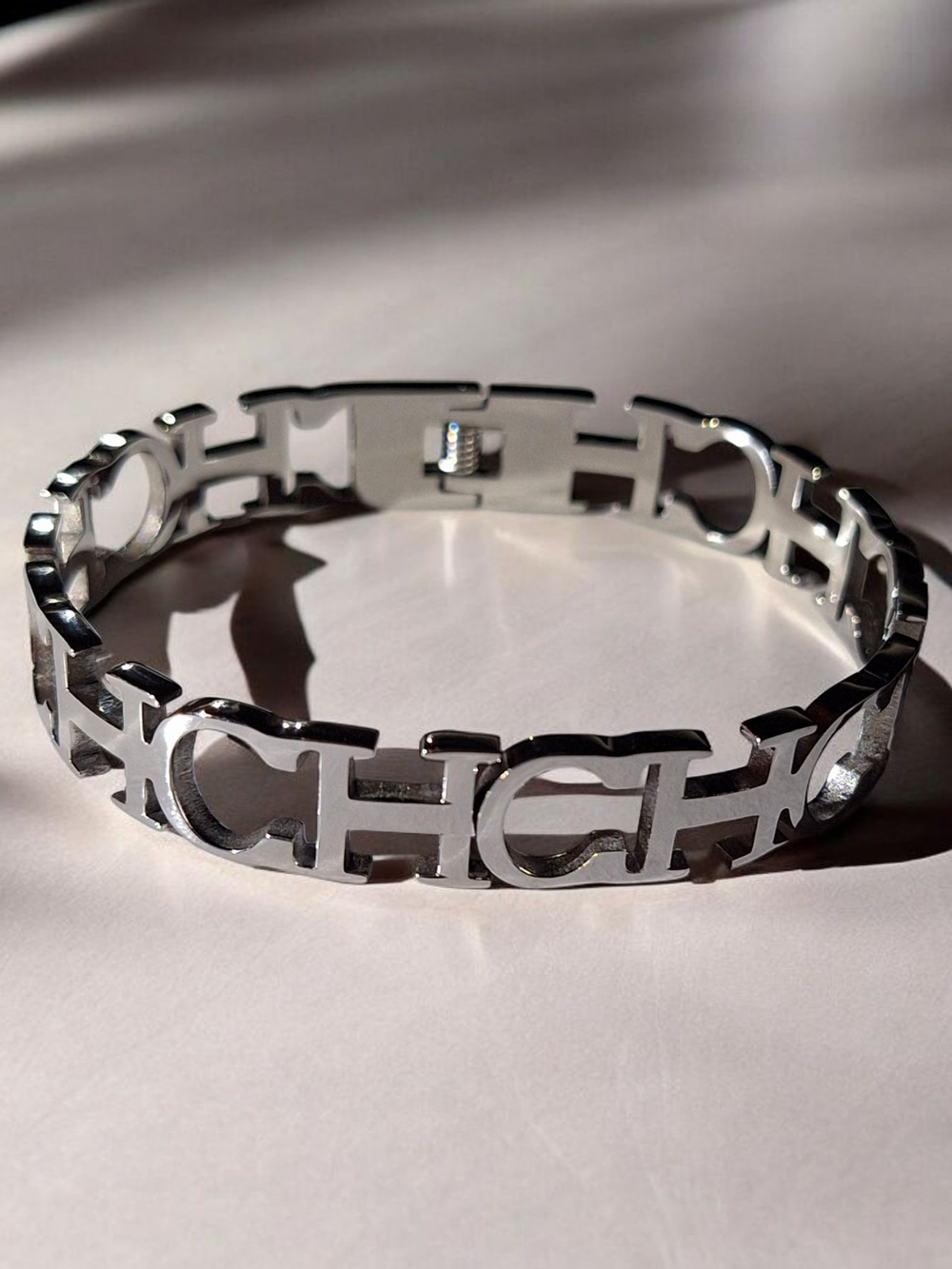 Silver Tone CH Bracelet